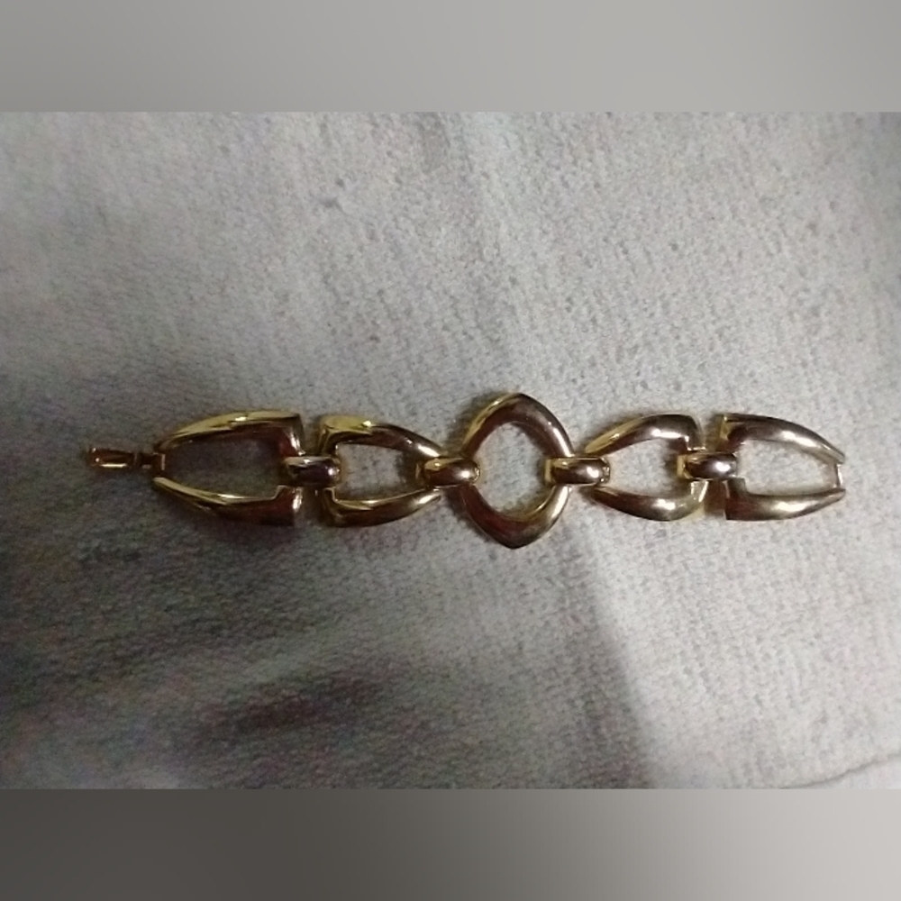 Wide goldtone link bracelet runway statement